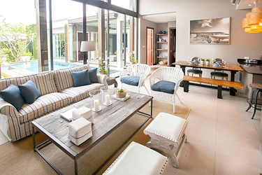 Living and Dining Area with garden and Pool View